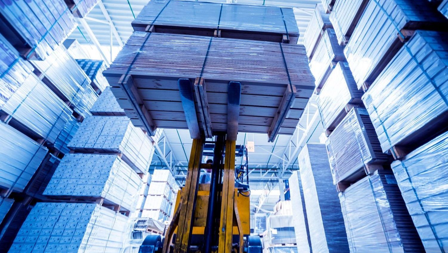 Forklift moving goods in a Bonded Warehouse
